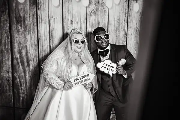 bride and groom pose in the Photo Booth